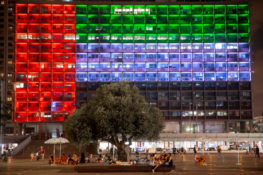 Tel Aviv City Hall is lit up with the flags of the United Arab Emirates and Israel as the countries announced they would be establishing full diplomatic ties, in Tel Aviv, Israel, Thursday, Aug. 13, 2020