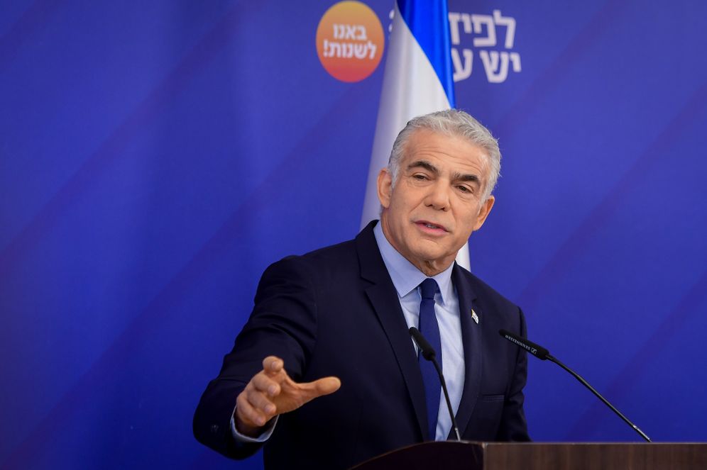 Israel's Prime Minister and head of the Yesh Atid party Yair Lapid speaks during a faction meeting in Tel Aviv, Israel, on October 18, 2022.