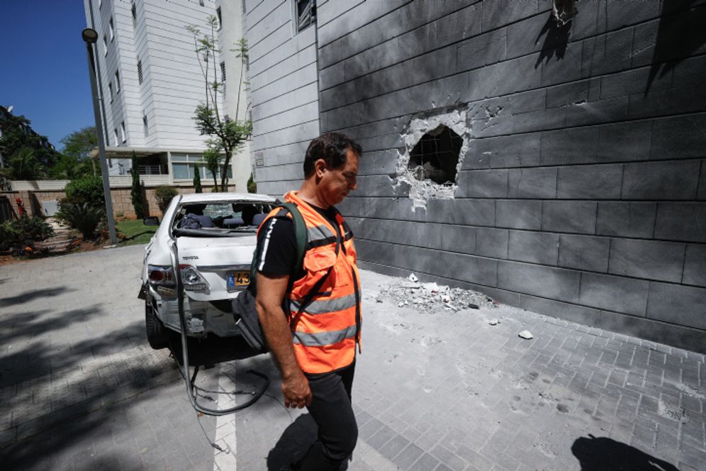 Damage caused to a building in the southern Israeli city of Ashkelon by a rocket fired by Gazan militants on May 14, 2021.