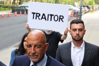 Thomas Barrack (L) arrives for a court appearance at the US District Court of Eastern District of New York, the United States, on July 26, 2021.