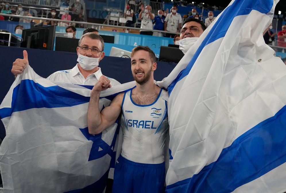 AP Photo/Natacha Pisarenko Artem Dolgopyat of Israel, celebrates after winning the gold medal on the floor exercise during the artistic gymnastics men's apparatus final at the 2020 Summer Olympics, August 1, 2021, in Tokyo.