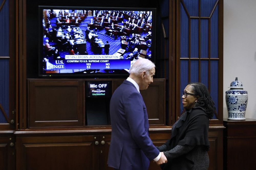 US President Joe Biden congratulates Ketanji Brown Jackson moments after the US Senate confirmed her to be the first Black woman to be a justice on the Supreme Court in the Roosevelt Room at the White House on April 07, 2022 in Washington, DC, US.