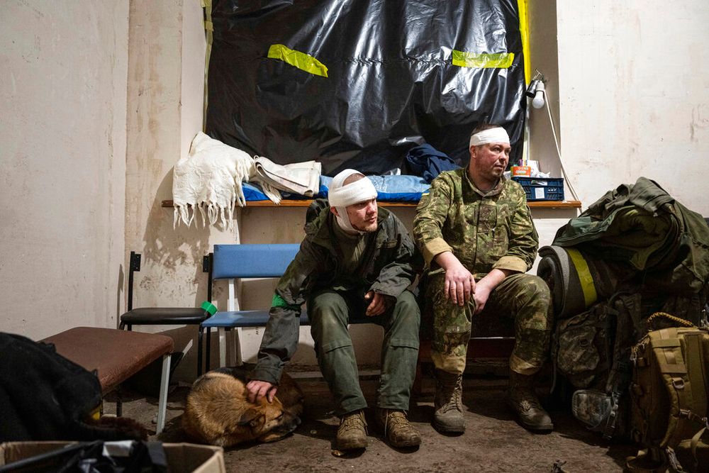 Ukrainian servicemen who were wounded on the battlefield wait to leave the field hospital near Bakhmut, Ukraine.