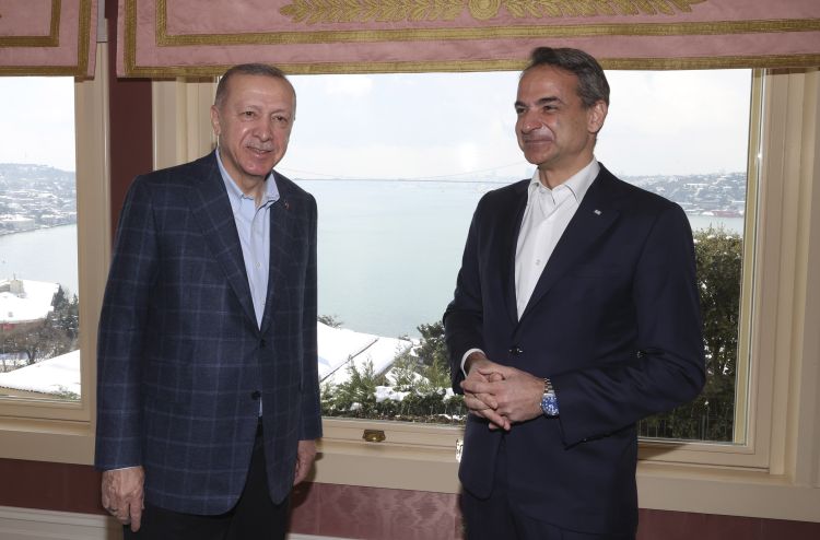Greek Prime Minister Kyriakos Mitsotakis, (R), talks to Turkish President Recep Tayyip Erdogan during their meeting in Istanbul, Turkey, March 13, 2022.