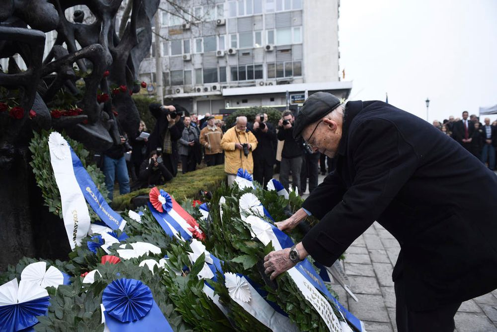 Heinz Kunio, a Jewish survivor of the Holocaust, places a wreath at a Holocaust Memorial, in the northern Greek city of Thessaloniki, Greece.