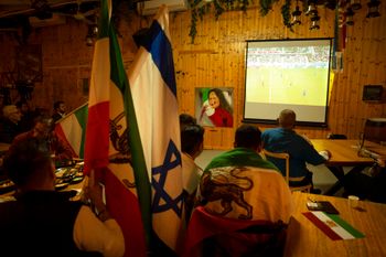 Israelis watch a live broadcast of the World Cup soccer match between Iran and the United States played in Qatar, at a restaurant in Bat Yam, near Tel Aviv, Israel.