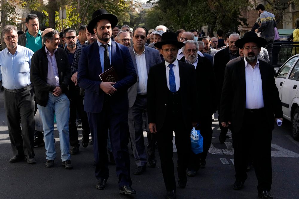 Iranian Rabbis and a group of Jewish community attend a gathering to condemn Israel's attacks on Gaza in Tehran, Iran, Monday, Oct. 30, 2023.