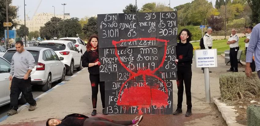 Women protest in Tel Aviv for International Day for the Elimination of Violence Against Women, November 25, 2019