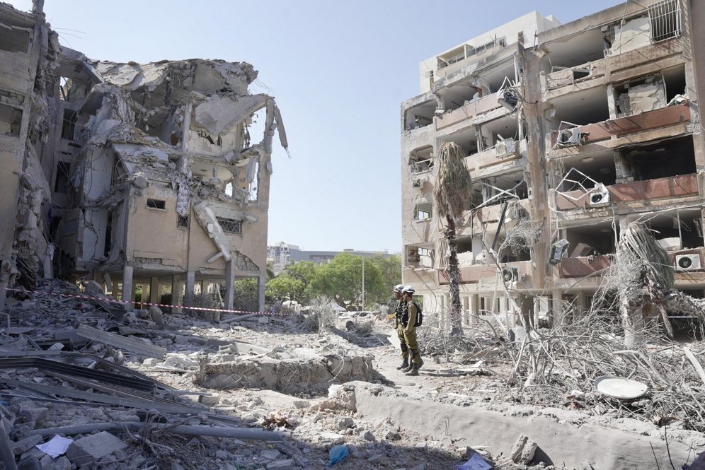 Impact site where a ballistic missile fired from Iran struck and caused damage in Holon, Israel, June 19, 2025