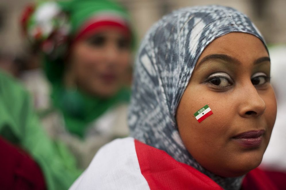 A British-based Somalilander with the flag of Somaliland stuck to her cheek attends a pro-independence rally outside Downing street in London on February 22, 2012.