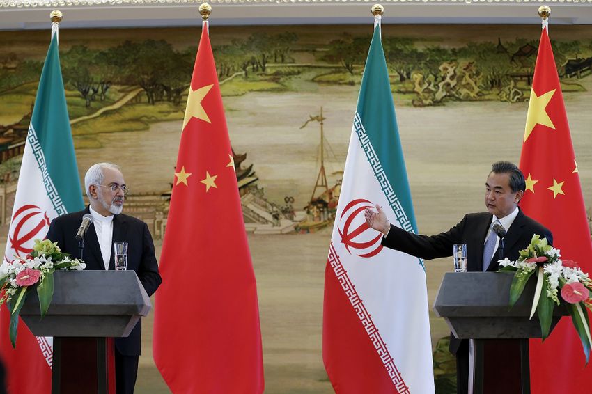 Chinese FM Wang Yi, right, and Iranian FM Mohammad Javad Zarif attend a joint press conference Tuesday, Sept. 15, 2015 in Beijing, China Chinese FM Wang Yi, right, and Iranian FM Mohammad Javad Zarif attend a joint press conference Tuesday, Sept. 15, 2015 in Beijing, China