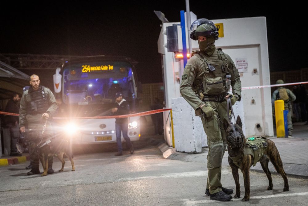 Israeli security at the scene of a terror attack in Shuafat, east Jerusalem.