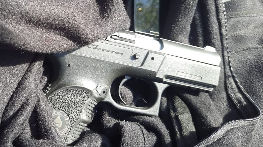 A handgun seized during the raid on Aqabat Jaber.