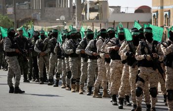 Palestinian Hamas militants take part in an anti-Israel military show in the southern Gaza Strip on November 11, 2019