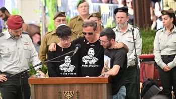 Roi, Robi, and Alon Chen at the funeral of Sergeant Major Itay Chen, today.