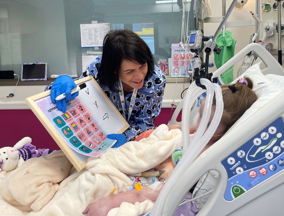 Clalit-Schneider Spokesperson’s Office Dr. Oshrat Sella Weiss with a patient.