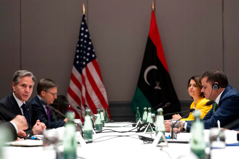 U.S. Secretary of State Antony Blinken (L) meets with Libyan Prime Minister Abdulhamid Dbeibeh (R) in Berlin, Germany.