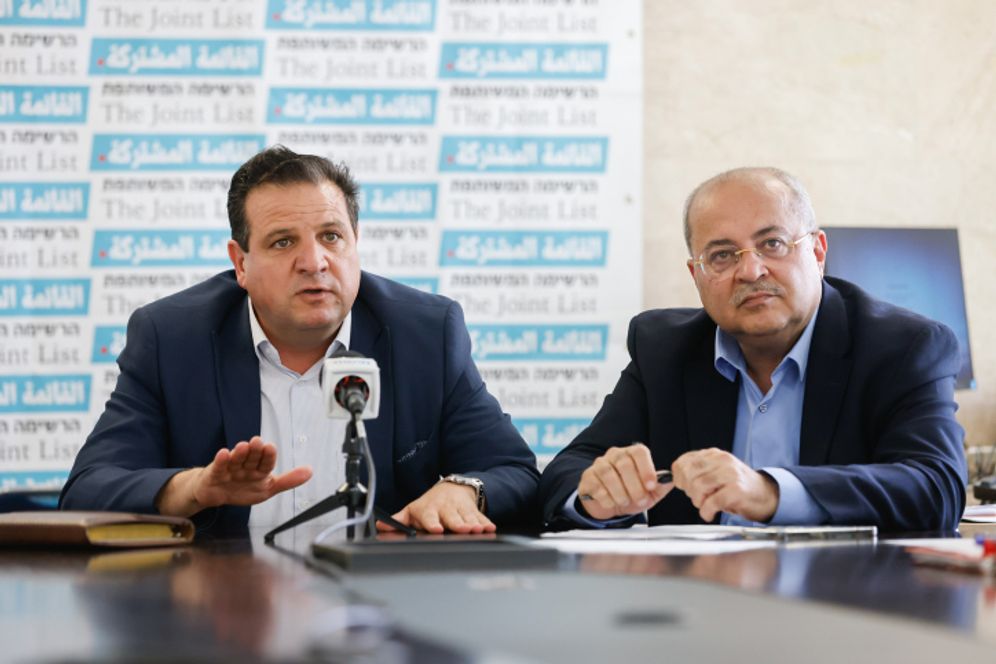 MK Ahmad Tibi and MK Ayman Odeh, head of the Joint Arab List attend a Joint Arab List faction meeting, at the Knesset, the Israeli parliament in Jerusalem, on May 30, 2022.