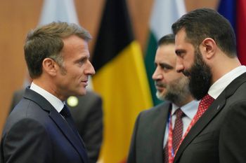 AP/Petros Karadjias FILE - French President Emmanuel Macron, left, talks with the Syrian President Ahmad al-Sharaa during the EU Summit in Nicosia, Cyprus, April 24, 2026.