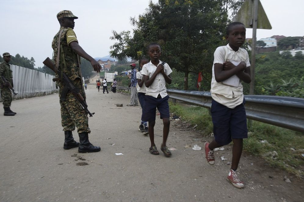 Illustration - school going pupils crossing the Democratic Republic of Congo (DRC) at Uganda's Mpondwe border - 25 people including children died in a terrorist attack on a school by the Islamic State-aligned Allied Democratic Forces.