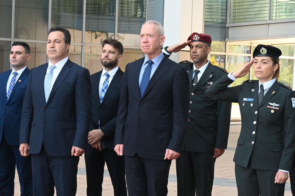 Israeli Defense Minister Yoav Gallant (C-Right) and his Albanian counterpart Niko Peleshi (2nd Left), with other Israeli officials in Tel Aviv, Israel.