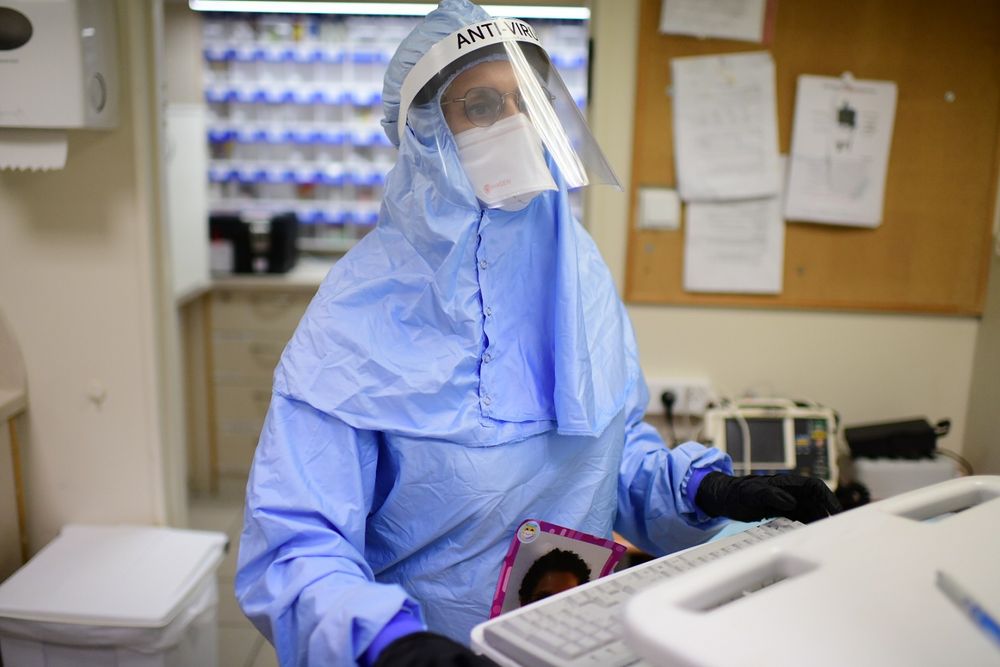 An Ichilov hospital team member wearing protective gear as she works at the coronavirus department, in Tel Aviv, on January 01, 2021.