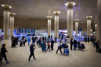 Passengers at the arrival hall in the Ben Gurion International airport near Tel Aviv
