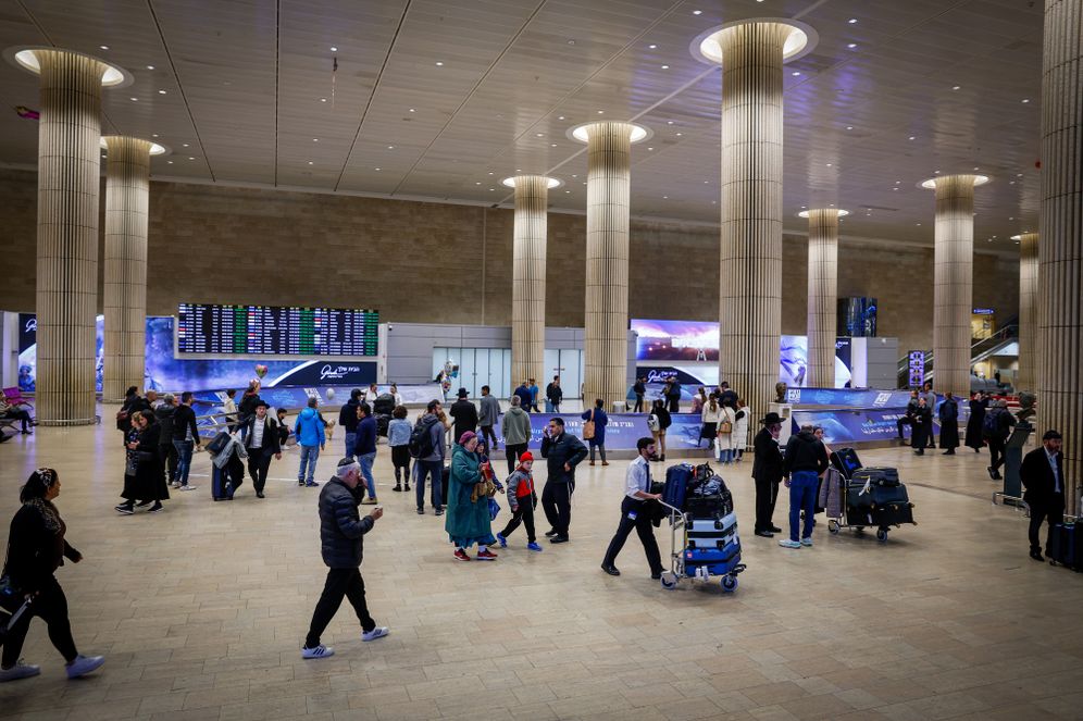 Passengers at the arrival hall in the Ben Gurion International airport near Tel Aviv