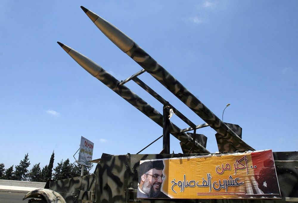 FILE -- A poster that shows Hezbollah leader Hassan Nasrallah is seen on a displayed armored vehicle in the southern village of Qassimiyeh, Lebanon Wednesday, July 11, 2007.