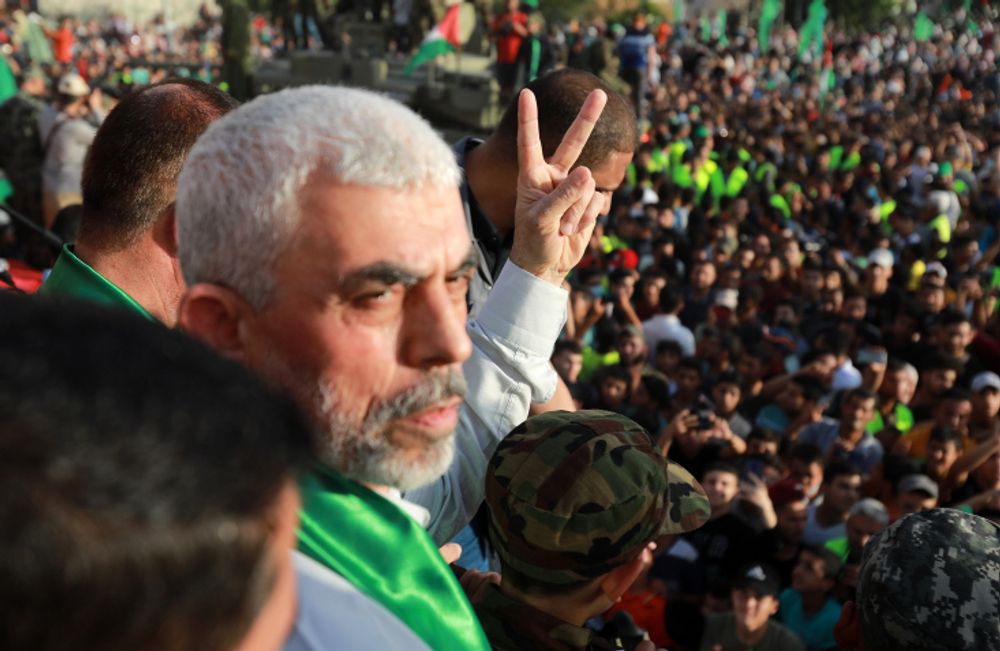 Yahya Sinwar, leader of the Palestinian Hamas movement, gestures during a rally in Beit Lahiya on May 30, 2021.