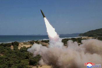Image provided by the North Korean government showing what it says was a test fire of tactical ballistic missile at an undisclosed site of North Korea