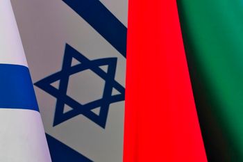 An Israeli flag (L) flutters next to an Emirati flag at Israel's pavilion at Expo 2020 in Dubai, United Arab Emirates.