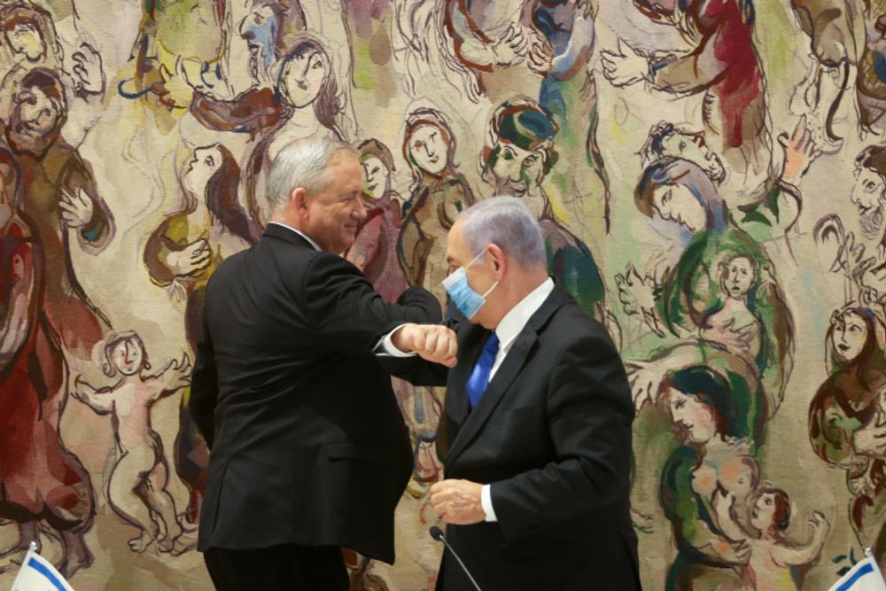 Israel's Prime Minister Benjamin Netanyahu (right) and Defense Minister Benny Gantz at the Knesset (Israel Parliament) in Jerusalem. May 17, 2020.