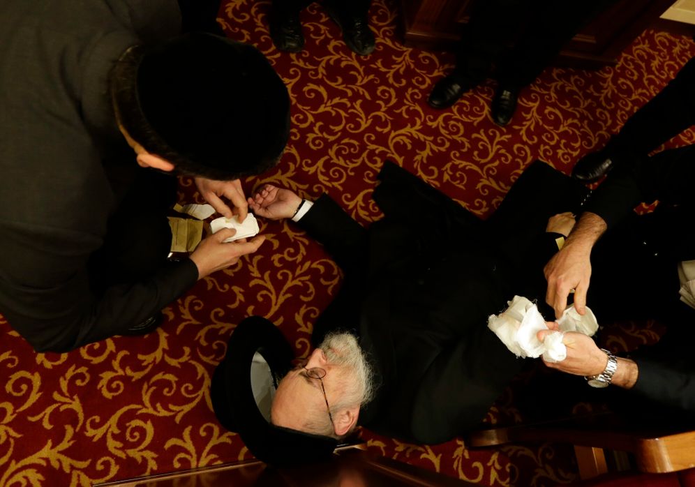 Rabbis take part in a first aid training during the Conference of European Rabbis in Prague, Czech Republic, Tuesday, Feb. 24, 2015. Due to the recent attacks on Jewish communities in Europe, part of the conference was a self defense and first aid training. 

