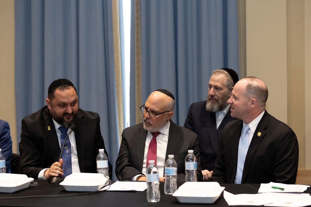 US Representative Timothy M. Kennedy (far right) with Rabbi Zamir Isayev (far left), chief rabbi of the Sephardi community of Baku, during a forum in US Congress