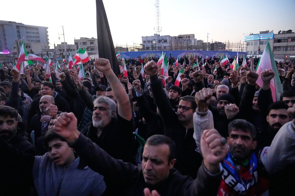 Government supporters chant slogans in a gathering after state TV officially announced the death of Iranian Supreme Leader Ayatollah Ali Khamenei, in Tehran, Iran, Sunday, March 1, 2026

