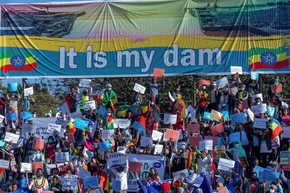 Ethiopians protest with a banner referring to The Grand Ethiopian Renaissance Dam, in Addis Ababa, Ethiopia.