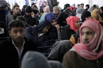 Hundred of Syrian families wait to register at the United Nations High Commissioner for Refugees (UNHCR) headquarters, in Beirut, Lebanon, Monday, Jan. 30, 2017.