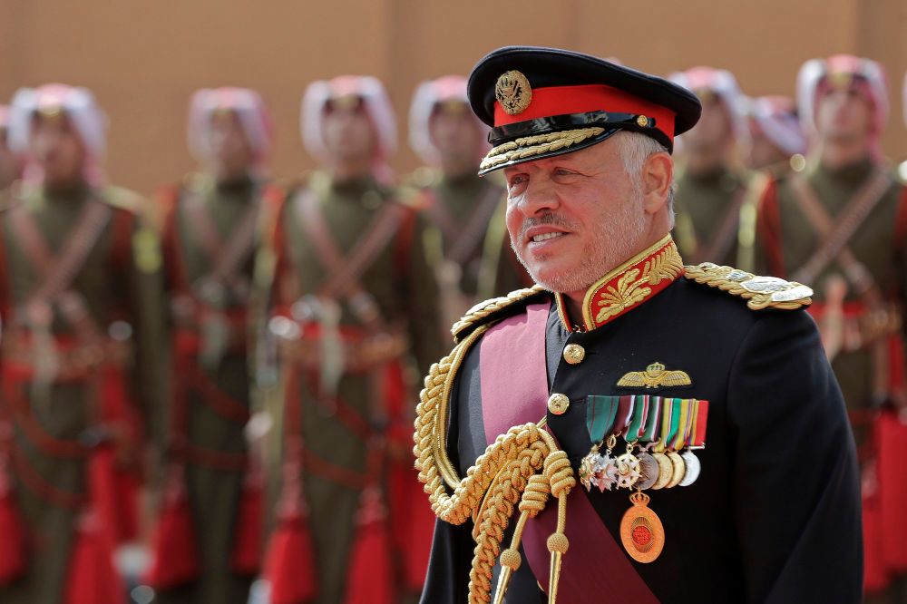 Jordan's King Abdullah II, reviews an honor guard before giving a speech to Parliament in Amman, Jordan, Sunday, Nov. 10, 2019