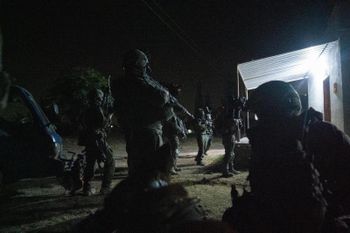 Israeli forces conducting a raid in southern Syria to apprehend an Iranian terrorist cell