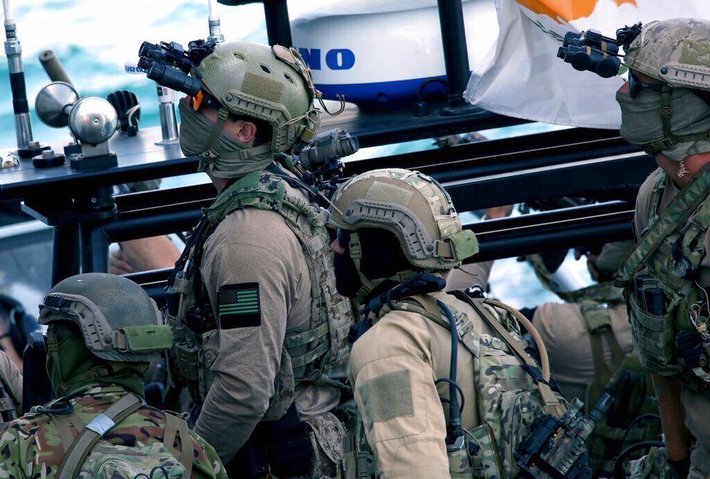 AP Photo/Philippos Christou Archive - A U.S. Navy SEAL special forces operator, second left, and colleagues during a joint U.S.-Cyprus military drill at Limassol port .