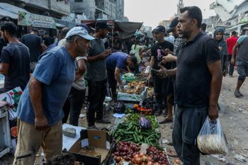 Palestinians shop at a market in Khan Yunis, in the southern Gaza Strip, September 25, 2026. 