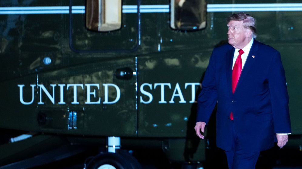 (AP Photo/Julia Demaree Nikhinson) President Donald Trump walks from Marine One after arriving on the South Lawn of the White House, Monday, Oct. 12, 2026, in Washington.
