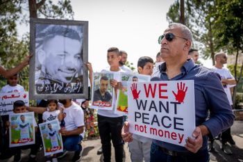 Members of the Israeli-Arab community protest in Jerusalem.