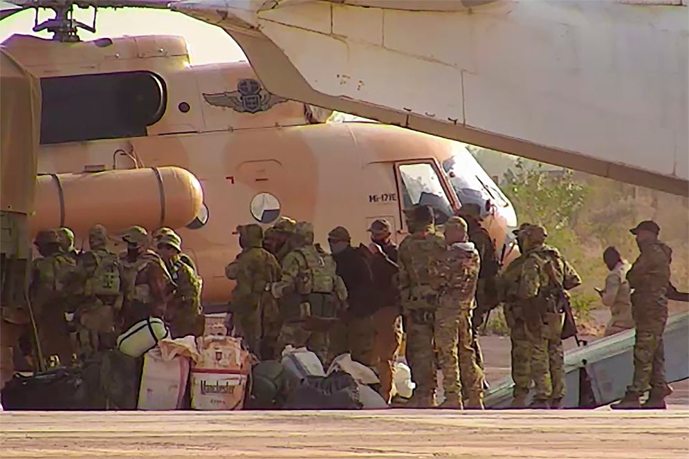 (French Army via AP, File) FILE - This undated photograph handed out by French military shows Russian mercenaries boarding a helicopter in northern Mali