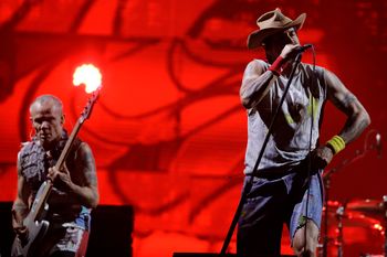 FILE - Anthony Kiedis, right, and bass player Flea of the band Red Hot Chili Peppers perform during the Rock in Rio music festival in Rio de Janeiro, Brazil, Oct. 4, 2019