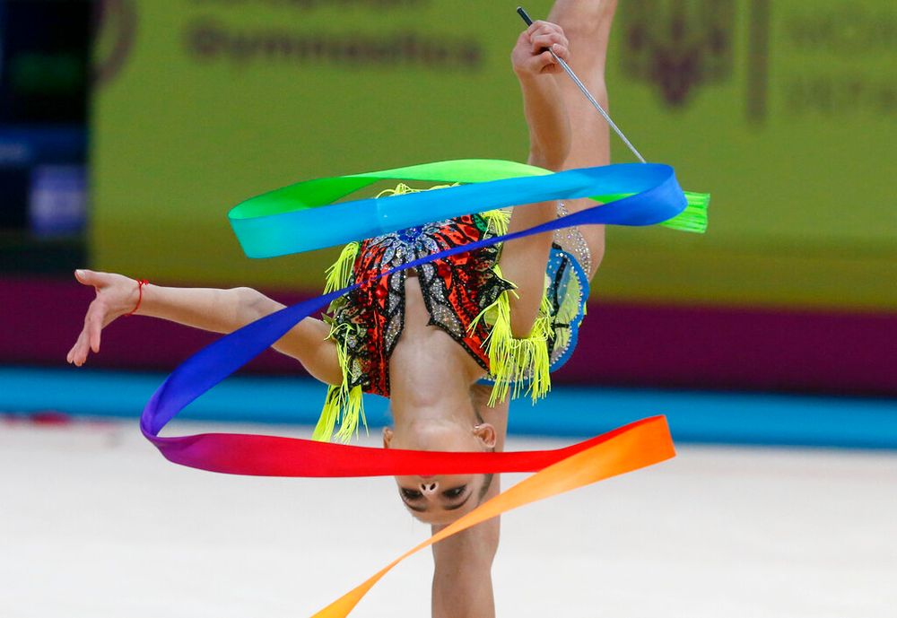 Daria Atamanov of Israel performs with the ribbon during the 36th European Rhythmic Gymnastics Championships in Kyiv, Ukraine, November 28, 2020.