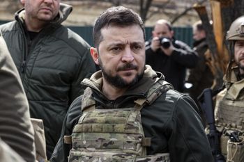Ukraine's President Volodymyr Zelensky stands in the town of Bucha, northwest of Ukraine's capital Kyiv, on April 4, 2022.