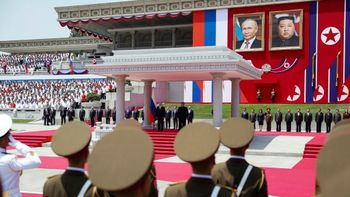 Russian President Vladimir Putin, rear left, and North Korea's leader Kim Jong Un, both are on the podium, attend the official welcome ceremony at the Kim Il Sung Square in Pyongyang, North Korea, Wednesday, June 19, 2024.