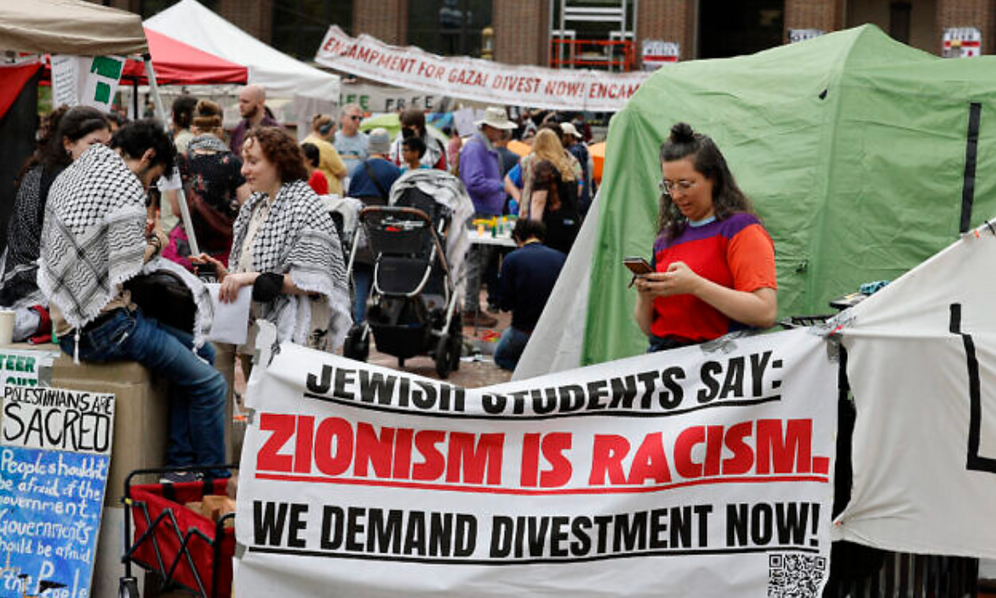 Anti-Israel students protest at an encampment on the University of Michigan campus in Ann Arbor on April 28, 2024
